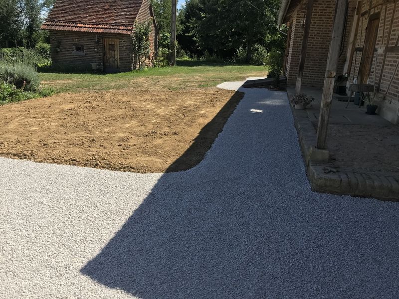 Réfection de cour et trottoir en gravillon